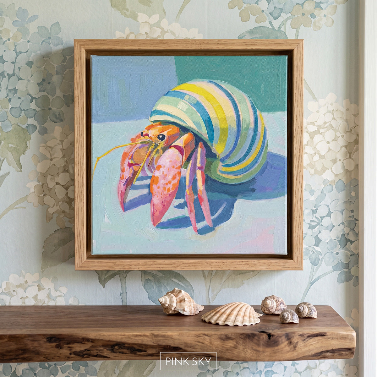 Colorful modern painting of a hermit crab with a pastel green and pink shell on a soft coastal background.