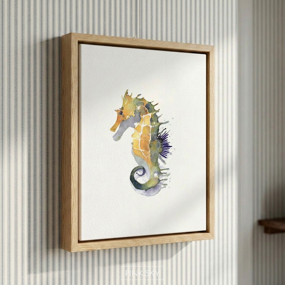 Watercolor seahorse artwork in soft coastal blues, sandy neutrals, and golden tones on a white background. Coastal-inspired wall art by Pink Sky Design.