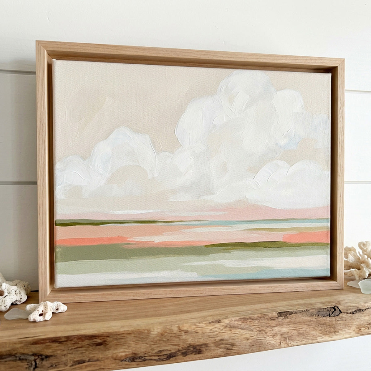 Soft modern coastal landscape painting with white clouds and pastel coral and blue horizon over calm water.